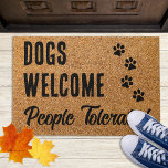 Dogs Welcome,People Tolerated - Rustic Funny Dog Doormat<br><div class="desc">Welcome guests with this funny doormat ! 
" Dogs Welcome ,  People Tolerated ". . 
Welcome Doormat - Dog Paw Print Floor Mat. Rustic natural faux coir and black design with paw prints. 
COPYRIGHT © 2020 Judy Burrows,  Black Dog Art - All Rights Reserved.</div>