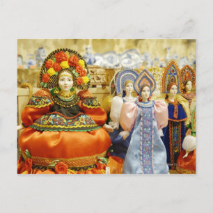 Dolls in traditional Russian costumes displayed Postcard