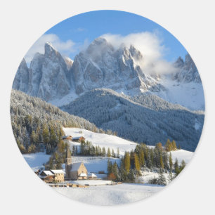 Dolomites village in winter round sticker