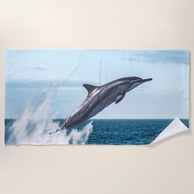 Dolphin leaping out of the ocean beach towel (Front)