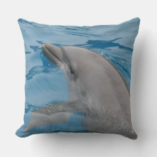 Dolphin Swimming Gracefully in Clear Blue Water Cushion