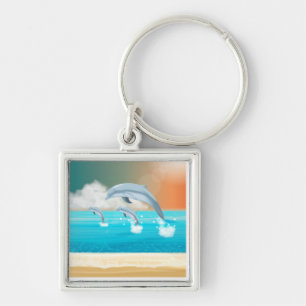 dolphins breaching in the ocean key ring