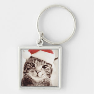 Domestic tabby cat wearing red Christmas hat Key Ring