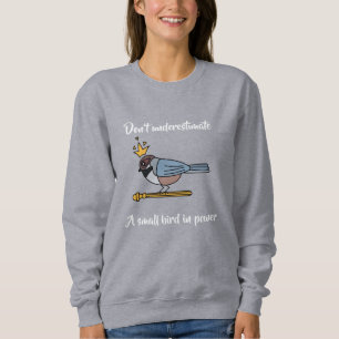 Don’t underestimate a small bird in power sweatshirt