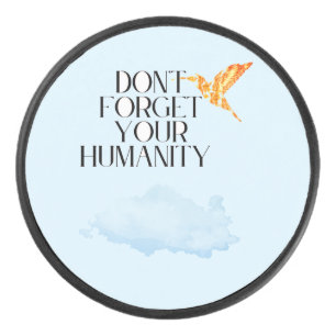 "Don't Forget Your Humanity – Elegant Gold Humming Hockey Puck