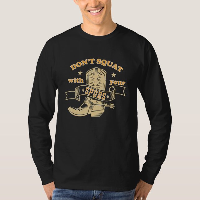 Dont Squat With Your Spurs Funny Saying Rodeo Funn T-Shirt (Front)