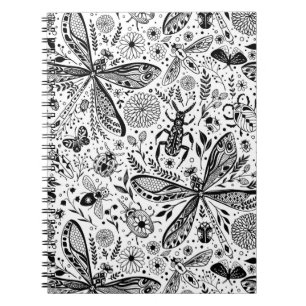 Doodle bugs on dark blue notebook