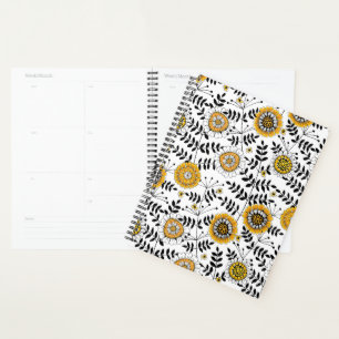 Doodle flowers and leaves in yellow and black planner