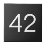 Door number tile<br><div class="desc">Edit the text and get a personalised product with a phrase or your name. In some products you can also upload an image.</div>