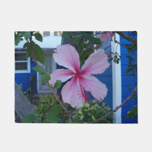 Doormat with pink hibiscus flower