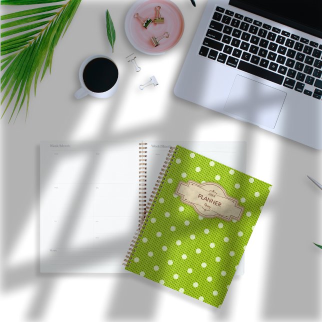 Dotty Delight Green Planner (Dotty Delight Green Planner on the desk. )