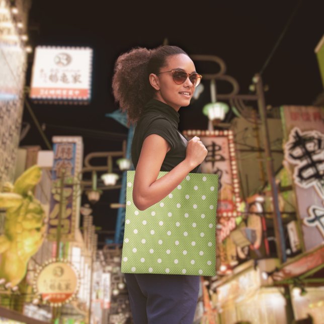 Dotty Delight Green Tote Bag (A woman holds a Dotty Delight Green Tote Bag.)