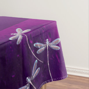 Dragonflies on water tablecloth