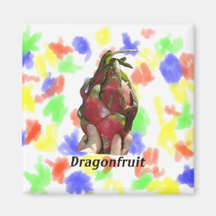 Dragonfruit held in fingers with text photo Pitaya Magnet