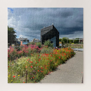 Dramatic skies and  wild flowers at Folkstone Jigsaw Puzzle
