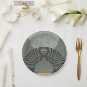 Drawing circles and lines in black, yellow , green paper plate