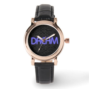DREAM text in neon lighting on brick Watch