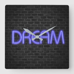 DREAM text in neon lights on brick Square Wall Clo Clock