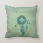 Dreamcatcher On a Misty Green Gold Background Cushion<br><div class="desc">Native American protective dreamcatcher. Turquoise blue, deep purple and soft golden coloured feathers hang down from a circular hoop designed with arrow and diamond shaped symbols in its centre. The dream catcher is a traditional symbol in Native American culture and spirituality, decorated with sacred objects and thought to aid in...</div>