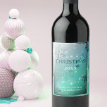 Dreamy Teal Silver Winter Wonderland Christmas  Wine Label<br><div class="desc">Add a touch of elegance and festive cheer to your holiday celebrations with our Christmas wine bottle label. This label features a beautiful teal background adorned with delicate snowflakes and twinkling lights, creating a magical winter wonderland scene. The silver border and text stand out against the teal background, offering a...</div>