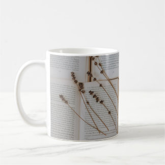 Dried flowers on books coffee mug