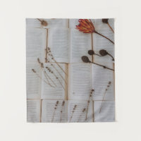 Dried flowers on books
