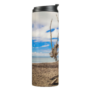 Driftwood artwork on Hokitika Beach, New Zealand Thermal Tumbler