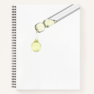 Dripping yellow serum from a pipette notebook