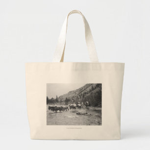 Driving pack mules across a river large tote bag