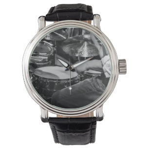 Drummer at work keeping time watch