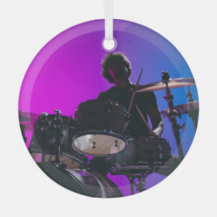 Drummer silhouette, neon blue-pink background. glass tree decoration