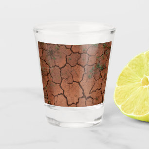 dry, cracked ground shot glass