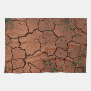 dry, cracked ground tea towel