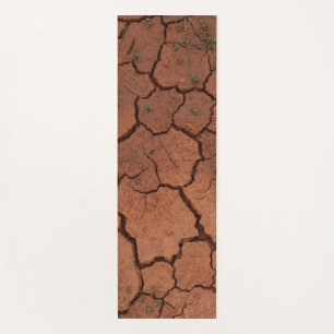 dry, cracked ground yoga mat