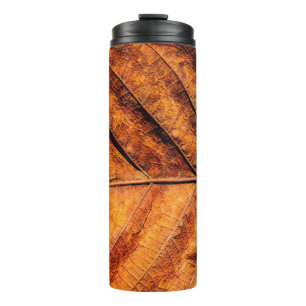 Dry leaf texture background thermal tumbler