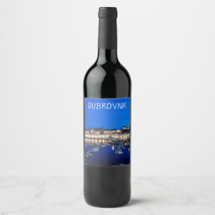 Dubrovnik harbor and walls illuminated at night wine label