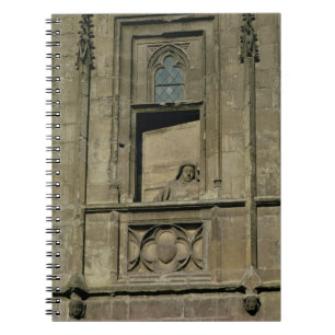 Dummy window in the entrance facade with a figure spiral notebook