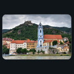 Dürnstein In Der Wachau Magnet<br><div class="desc">Dürnstein is a small town on the Danube river in the Krems-Land district, in the Austrian state of Lower Austria.Dürnstein was first mentioned in 1192, when, in the castle above the town, King Richard I of England was held captive by Leopold V, Duke of Austria after their dispute during the...</div>