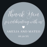 Dusty Blue Calligraphy Wedding Thank You Favour Classic Round Sticker<br><div class="desc">The perfect little something to seal your wedding favour box or thank you note. The thank you sentiment is written in a playful script font then your name and wedding date are in a classic serif text. A sweet heart separates them. This item is part of the Elegant Minimalist Wedding...</div>