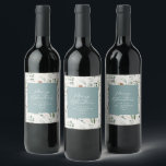Dusty blue Christmas minimal elegant botanical Wine Label<br><div class="desc">Modern minimum foliage sage green script holiday Christmas personalised photo design. Hand painted eucalyptus,  minimal foliage and modern rustic rattan wreath give this holiday design a luxurious feel. In classy dusty blue,  green,  black,  browns and greys.</div>