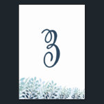 Dusty Blue Greenery Wedding Table Number Card<br><div class="desc">Bring a polished and cohesive look to your reception tables with these elegant botanical wedding table number cards. Featuring soft dusty blue and muted green foliage along the base, this design adds a subtle, nature-inspired accent while maintaining a clean and modern aesthetic. The large script table number creates a graceful...</div>