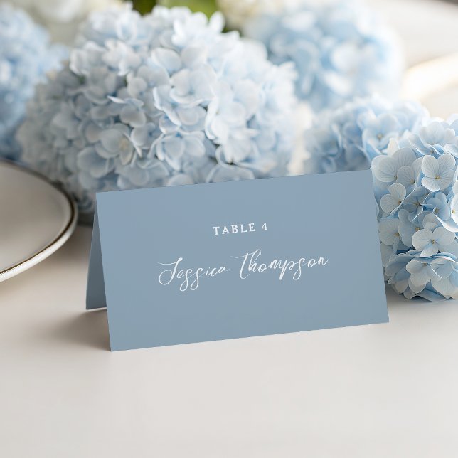 Dusty Blue Simple Script Elegant Wedding Place Card (Elegant and simple typography on a beautiful dusty blue background)