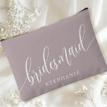 Dusty Lavender Bridesmaid Modern Calligraphy Accessory Pouch<br><div class="desc">Celebrate your bridal party with this elegant dusty lavender purple bridesmaid accessory pouch. Featuring modern calligraphy and customisable with your bridesmaid's name, this pouch is both stylish and practical. The soft dusty sage colour and elegant script create a sophisticated look, perfect for holding makeup, toiletries, or other essentials. This personalised...</div>