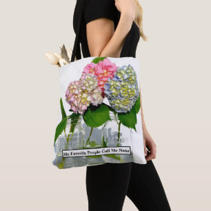 Dusty pink blue yellow green floral hydrangeas  tote bag
