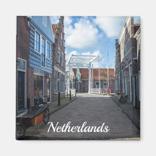 Dutch village with traditional wooden bridge magne magnet