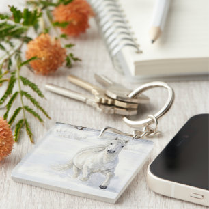 Dyfra the Icelandic Horse Galloping in Snow Key Ring