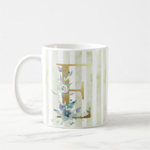 E golden initial on blue and white stripes coffee mug