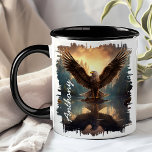 Eagle Soaring Over Lake Reflection Mug<br><div class="desc">Start your day with the powerful image of the Eagle Soaring Over Lake Reflection Mug. This dynamic mug features a majestic eagle spreading its wings over a tranquil lake, with the stunning reflection of the eagle and the surrounding forest captured in the water below. Customised with your name, it adds...</div>