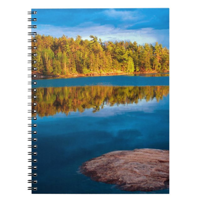 Early Evening reflections in the boundry waters Spiral Notebook (Front)