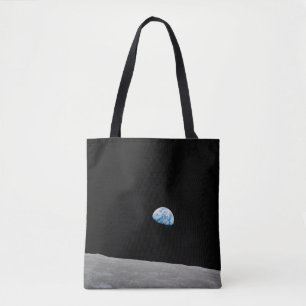 Earth Rising Above The Lunar Horizon. Tote Bag